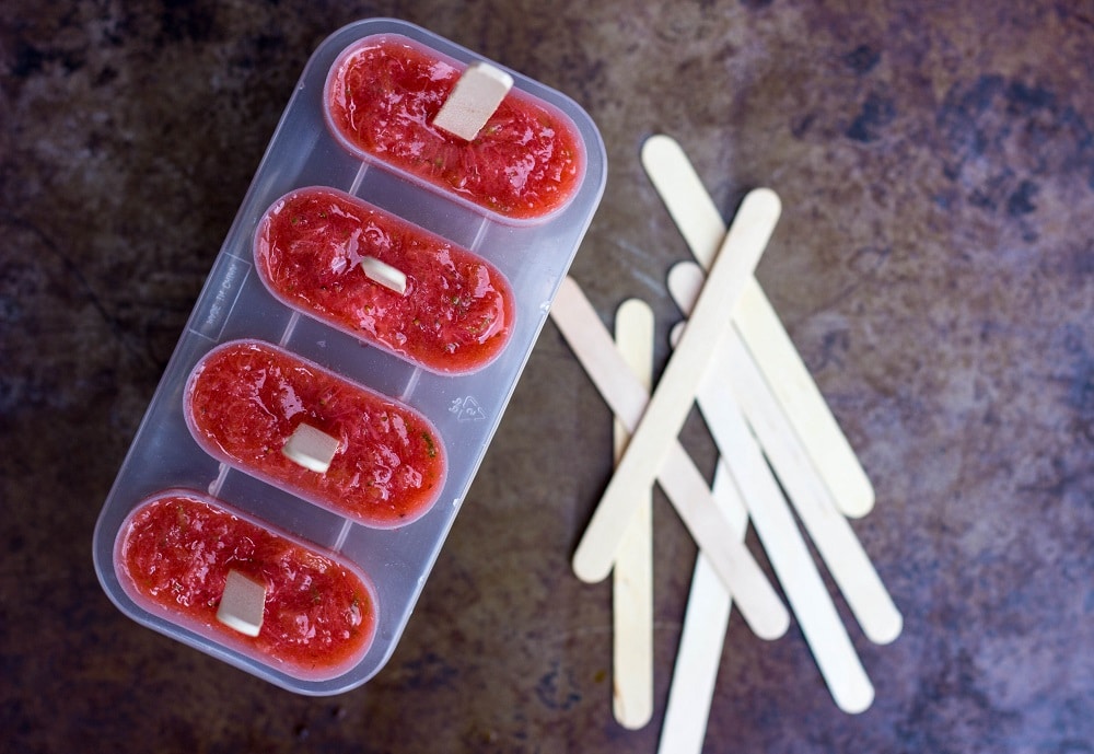 Strawberry Rhubarb & Lime Popsicles in the popsicle mold