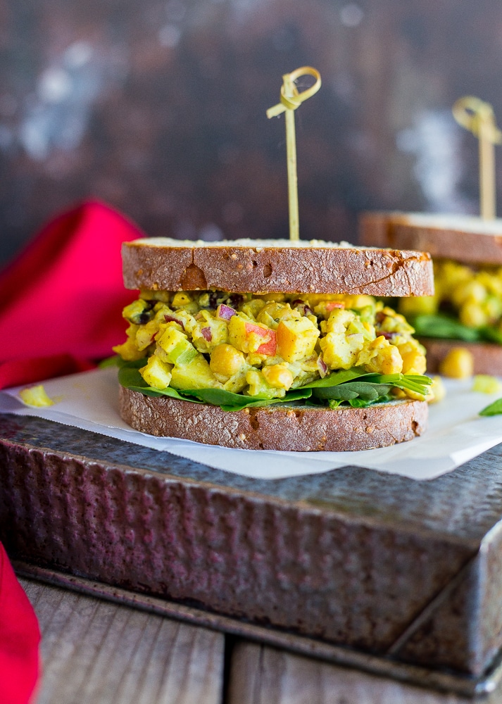 These Curried Chickpea Salad Sandwiches only take about 10 minutes to make and have the most amazing flavors! You will be eating them for lunch all winter long! {gluten free, vegan}