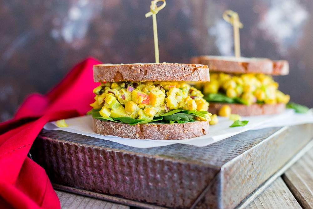 These Curried Chickpea Salad Sandwiches only take about 10 minutes to make and have the most amazing flavors! You will be eating them for lunch all winter long! {gluten free, vegan}