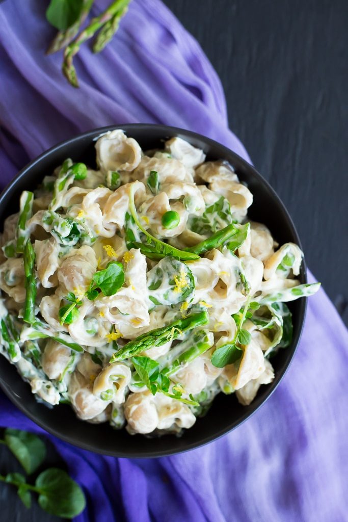 This Creamy Cashew Lemon Pasta with Spring Vegetables is the perfect bite of spring!  It's creamy, delicious and packed with lots of fresh vegetables! {vegan, gluten free}