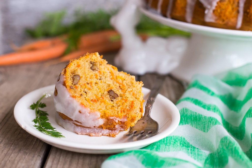 Gluten Free Carrot Pound Cake with Coconut Milk Icing! A delicious spring time dessert that no one will be able to tell is gluten free! So moist and flavorful!