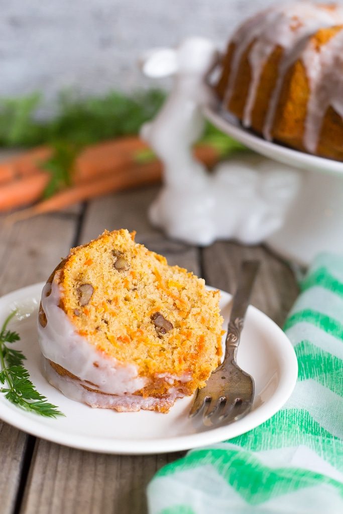 Gluten Free Carrot Pound Cake with Coconut Milk Icing! A delicious spring time dessert that no one will be able to tell is gluten free! So moist and flavorful!