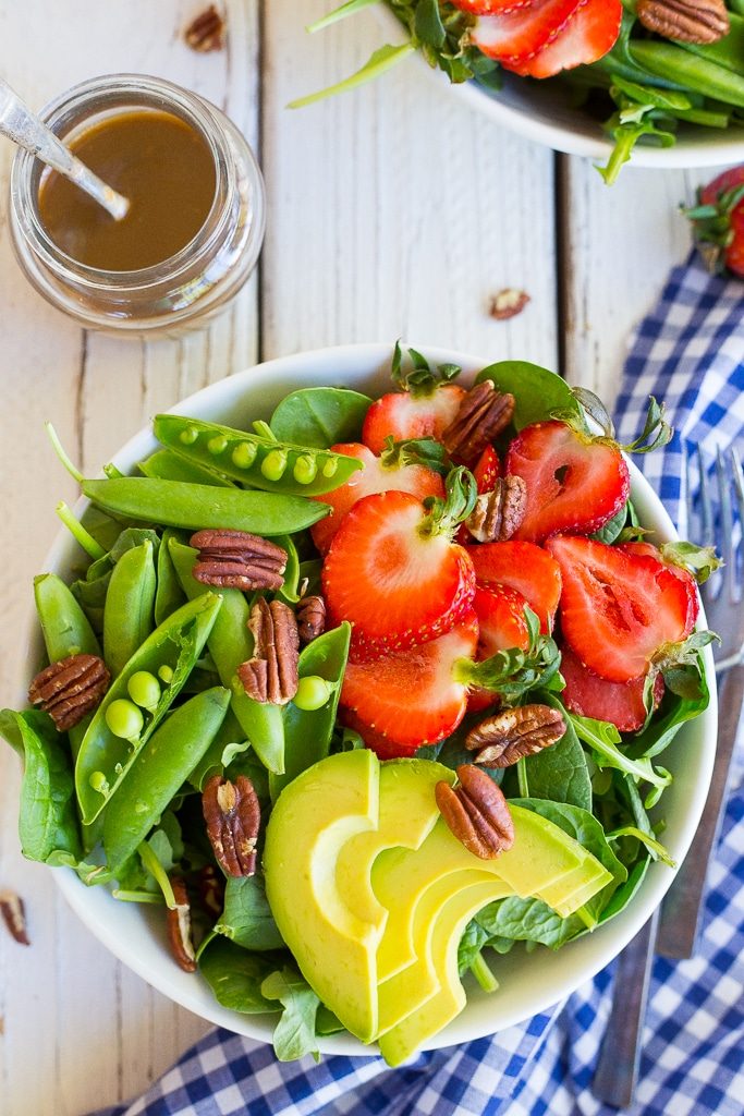this Strawberry Avocado & Sweet Pea Salad with Tahini Balsamic Dressing has the perfect taste of spring in every bite!  Balsamic tahini dressing is so rich and creamy! {vegan, gluten free}