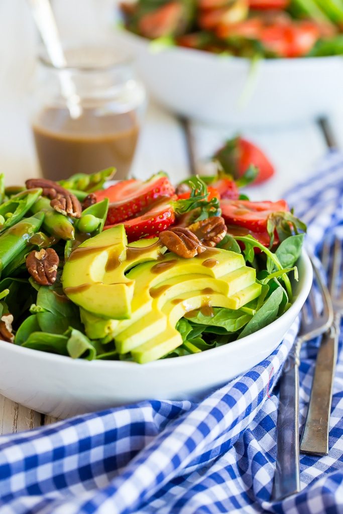 this Strawberry Avocado & Sweet Pea Salad with Tahini Balsamic Dressing has the perfect taste of spring in every bite!  Balsamic tahini dressing is so rich and creamy! {vegan, gluten free}