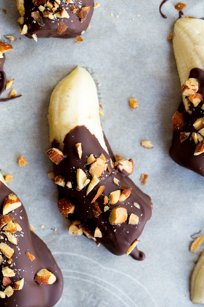 These Mini Chocolate Covered Frozen Bananas with Almonds only require 3 ingredients and are a delicous healthy treat for the summer! {gluten free, vegan}
