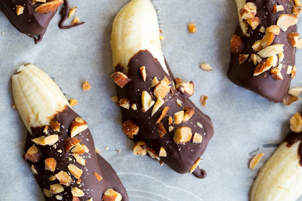 These Mini Chocolate Covered Frozen Bananas with Almonds only require 3 ingredients and are a delicous healthy treat for the summer! {gluten free, vegan}