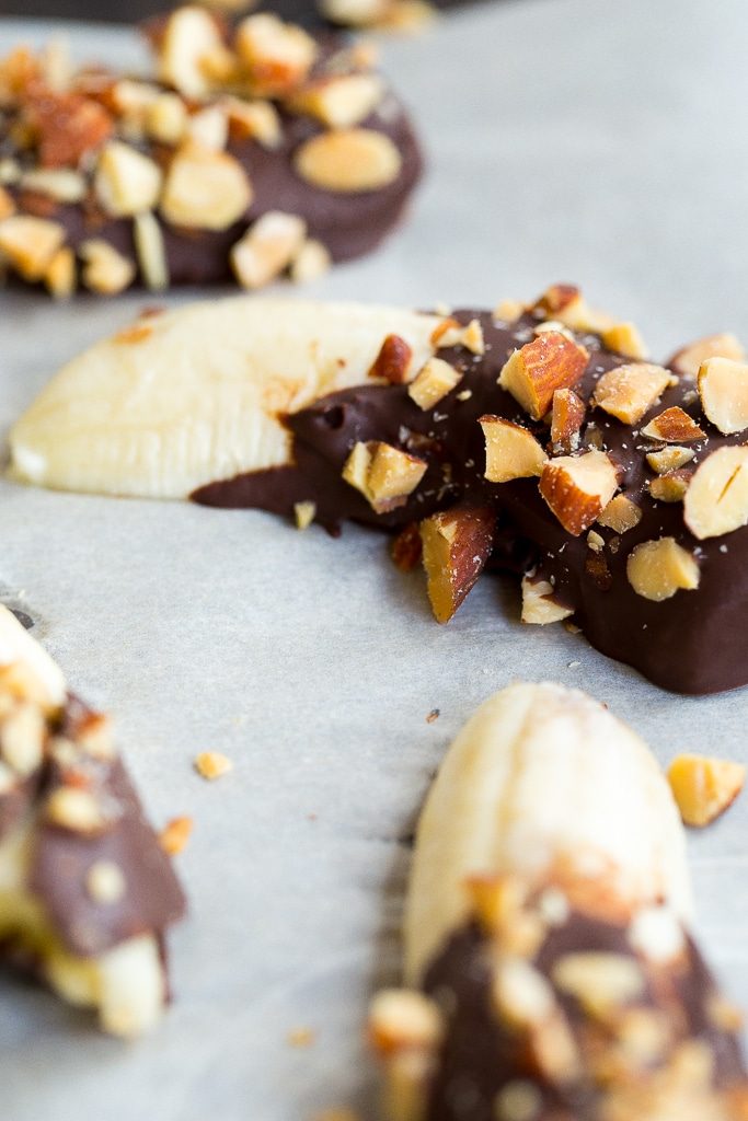 These Mini Chocolate Covered Frozen Bananas with Almonds only require 3 ingredients and are a delicous healthy treat for the summer! {gluten free, vegan}