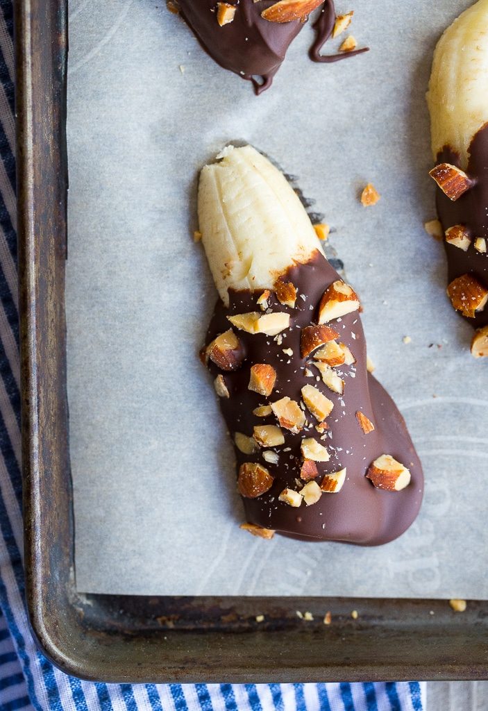 These Mini Chocolate Covered Frozen Bananas with Almonds only require 3 ingredients and are a delicous healthy treat for the summer! {gluten free, vegan}