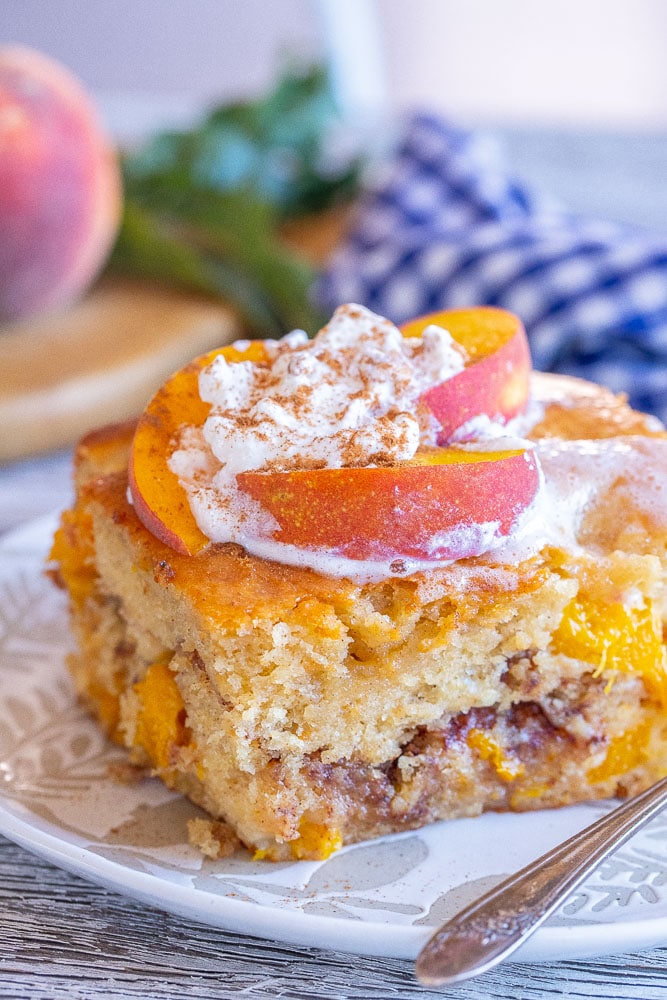 close up of peach cake with streusel filling
