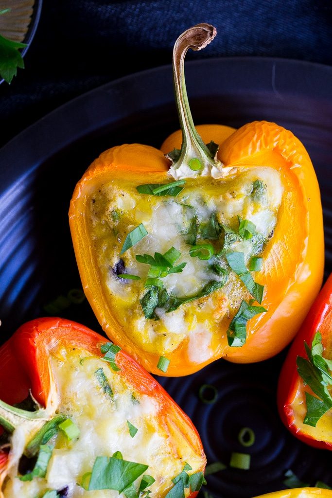 These healthy and hearty Loaded Breakfast Stuffed Peppers can be made ahead of time and re-heated for a delicious breakfast all week long!