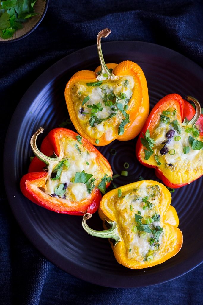 These healthy and hearty Loaded Breakfast Stuffed Peppers can be made ahead of time and re-heated for a delicious breakfast all week long!