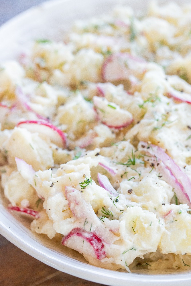 Close-up of a vegan potato salad in a bowl