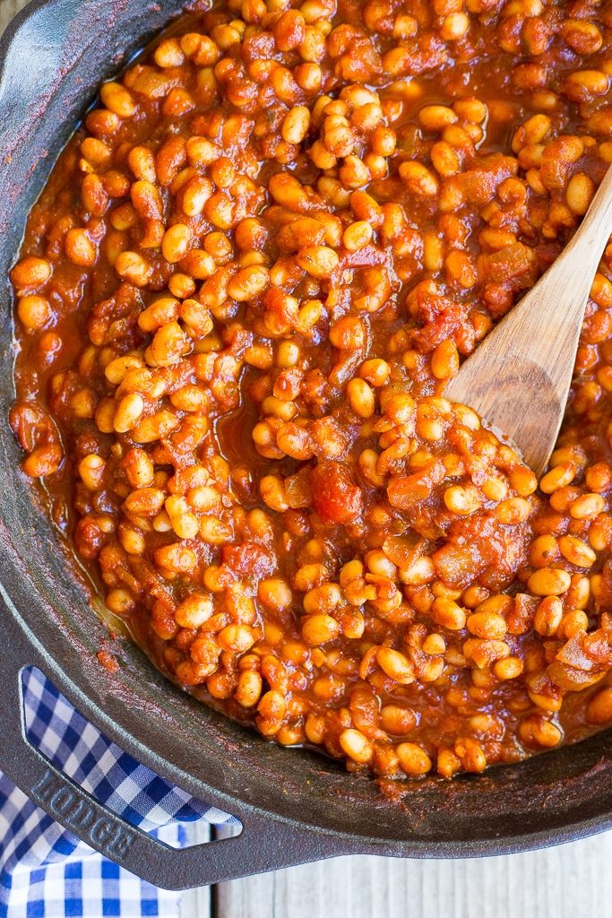 stovetop baked beans in a pan with a spoon