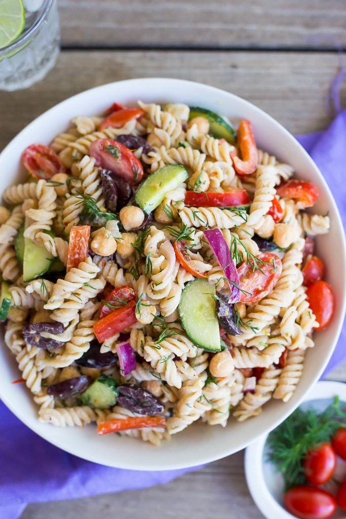 This Creamy Tahini Greek Pasta Salad is so easy to make and perfect for lunch!  It's vegan, gluten free and full of delicious vegetables and creamy pasta!