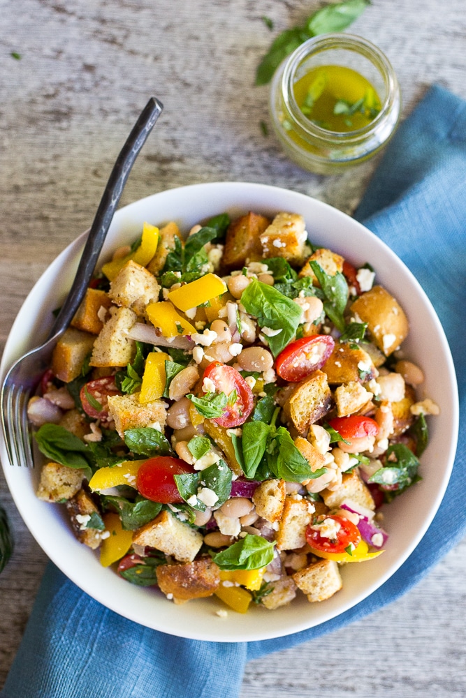 This Spinach and White Bean  Panzanella Salad with Basil Vinaigrette is fresh, filling and delicious!  It's the perfect meal for lunch that can also be made ahead! {gluten free}