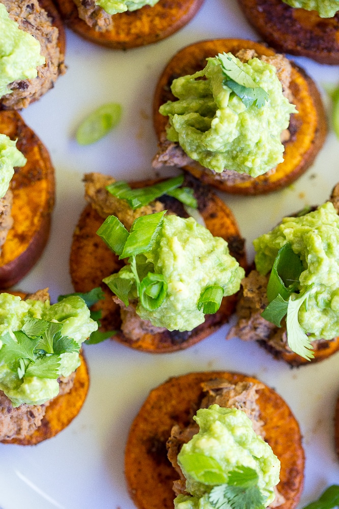 These Sweet Potato Bites with Back Bean Hummus & Guacamole are packed with so much delicious flavor and make for perfect appetizers or a light lunch! {gluten free, vegan}