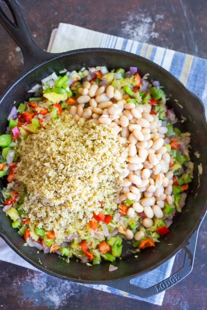 This Spaghetti Squash Pizza Bake with Quinoa & White Beans is packed with protein and delicious flavor!  Great for a weeknight dinner or a holiday main course!  Gluten free and vegan too!