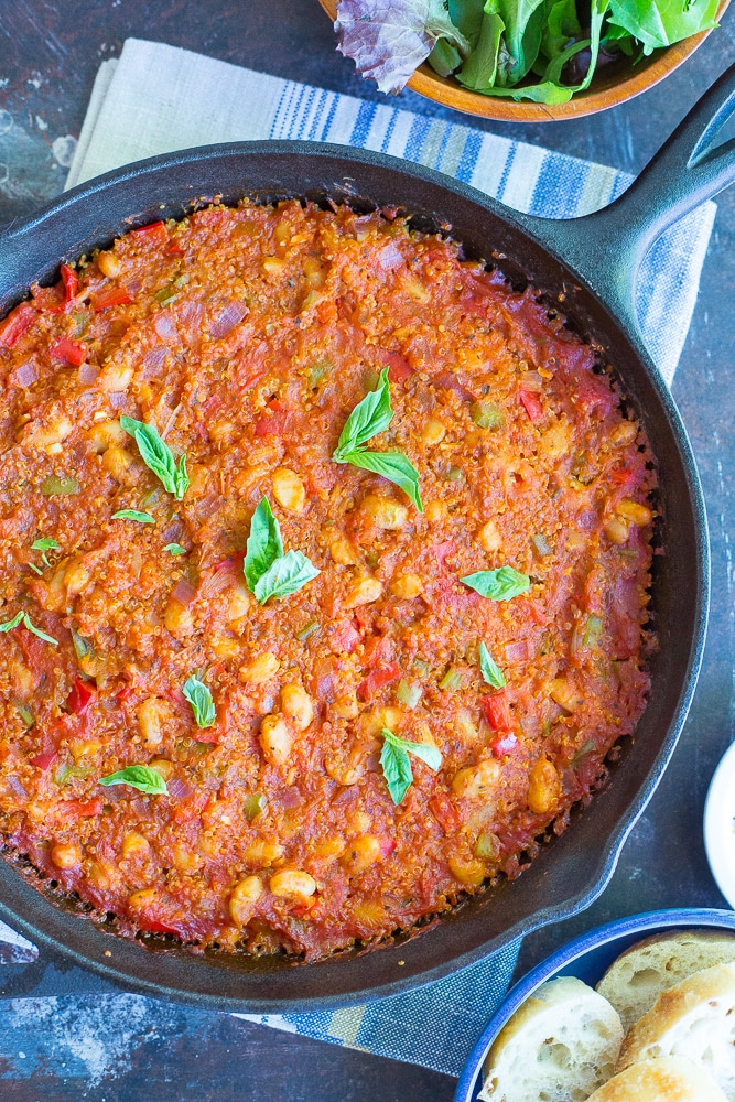 This Spaghetti Squash Pizza Bake with Quinoa & White Beans is packed with protein and delicious flavor!  Great for a weeknight dinner or a holiday main course!  Gluten free and vegan too!
