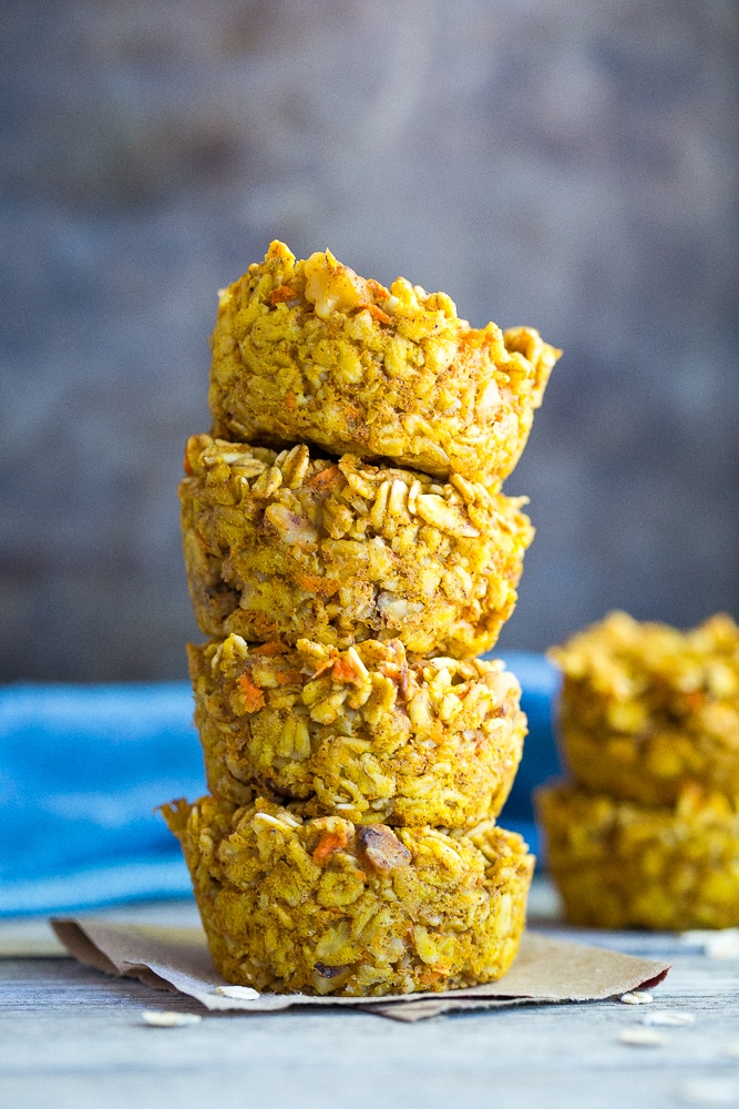 These Healthy Pumpkin and Carrot Baked Oatmeal Cups are perfect for a freezer friendly make ahead breakfast that is easy to grab and go with! Vegan and gluten free too!