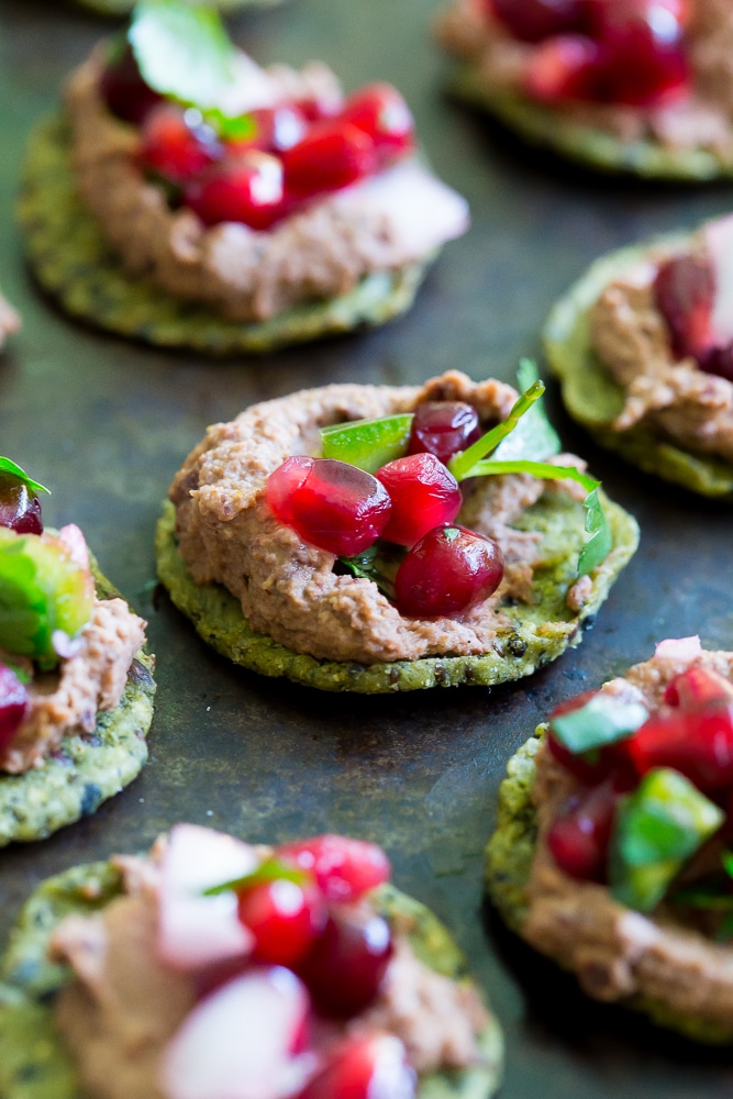 Kale Crackers with Black Bean Hummus and Pomegranate Salsa- A delicious and fun snack or appetizer to serve at your next party!  Gluten free and vegan!