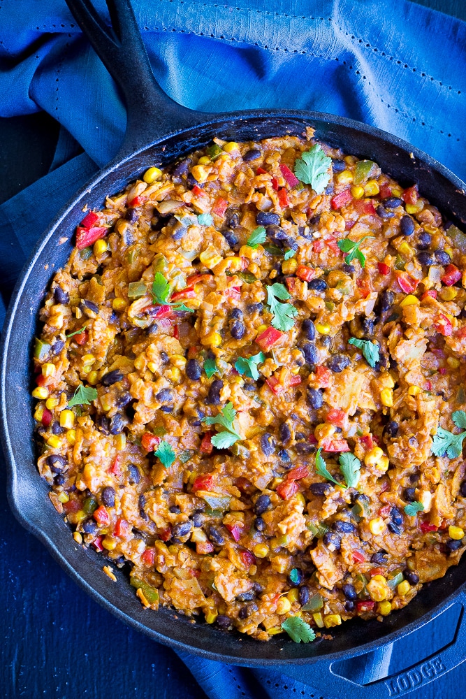 Easy Stove Top Enchiladas with Cauliflower Rice - This delicious vegetarian dinner recipe is packed with vegetables making it a really healthy option that everyone will love!  Comes together in no time for a quick and easy weeknight dinner!  Vegan and gluten free!