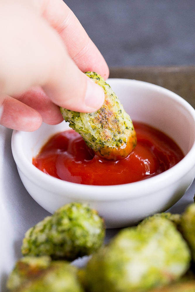 These 4 Ingredient Broccoli Tater Tots are packed with tons of broccoli and baked in the oven making them a really healthy side dish or snack!  A perfect way to get some extra veggies into your life!  Vegan and gluten free!