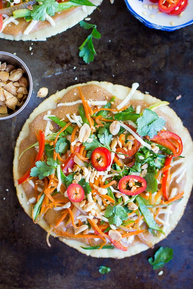 These Easy Thai Vegetable Pita Pizzas only take 30 minutes to make and are great for a delicious vegetarian weeknight dinner!  Gluten free and vegan option too!