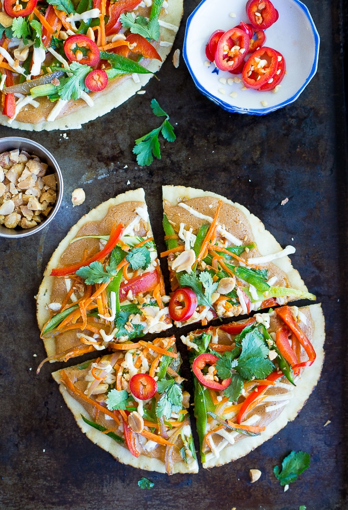 These Easy Thai Vegetable Pita Pizzas only take 30 minutes to make and are great for a delicious vegetarian weeknight dinner!  Gluten free and vegan option too!