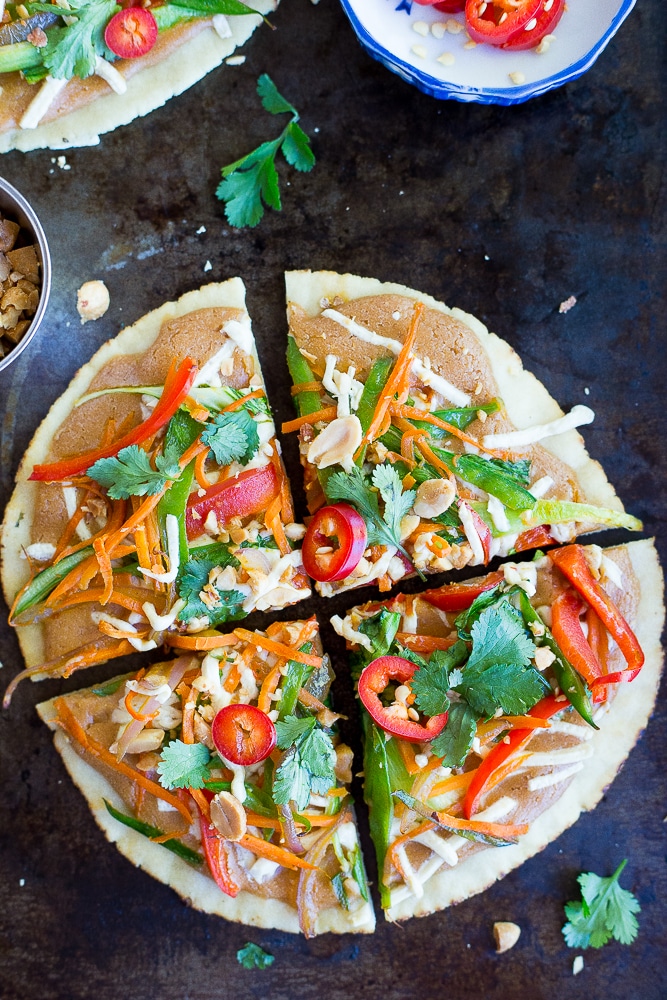 These Easy Thai Vegetable Pita Pizzas only take 30 minutes to make and are great for a delicious vegetarian weeknight dinner!  Gluten free and vegan option too!