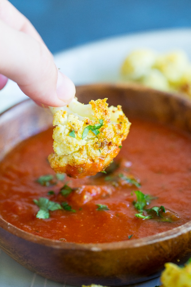 Baked Cauliflower Pizza Bites- These would be a great healthy afternoon snack or the perfect side dish for dinner!  Make them as a healthier option to go with your next pizza night!  Gluten free and vegan!