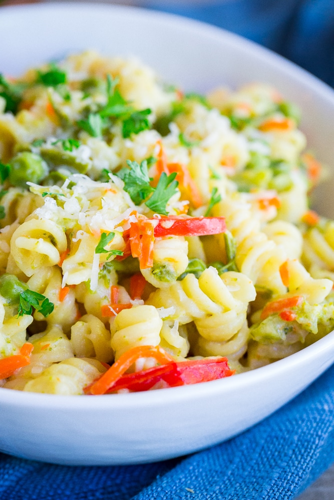 Easy One-Pot Pasta Primavera - A quick and easy vegetarian dinner recipe that only requires one pot. It's packed with tons of fresh veggies making it a healthy option too!