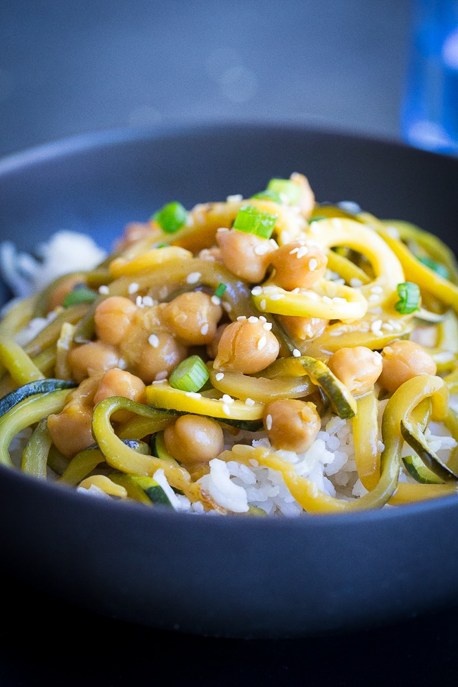  These 30 Minute Orange Ginger Zucchini Noodle Chickpea Bowls are great for a quick and easy vegetarian (and vegan) weeknight dinner!  They're also perfect for a healthy make ahead lunch bowl!  Gluten free too!