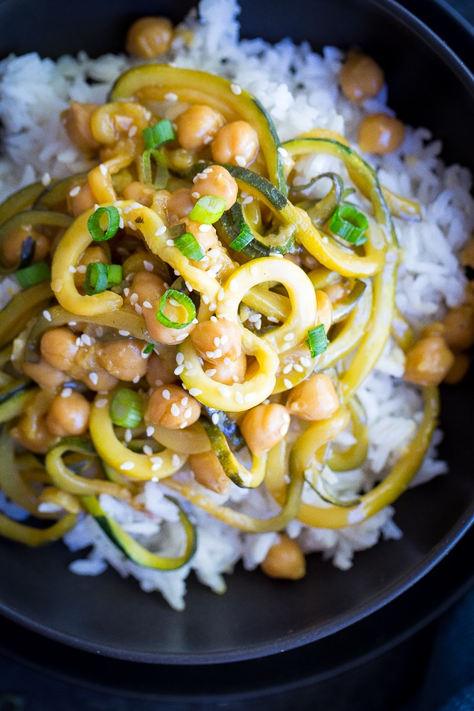  These 30 Minute Orange Ginger Zucchini Noodle Chickpea Bowls are great for a quick and easy vegetarian (and vegan) weeknight dinner!  They're also perfect for a healthy make ahead lunch bowl!  Gluten free too!