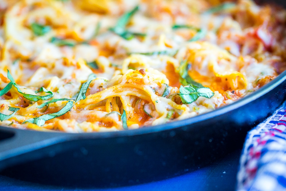 Lower Carb Zucchini Noodle Spaghetti Bake- This delicious pasta bake is packed with tons of zucchini and just small amount of pasta making it a great low carb dinner option. Vegetarian/ Quick and Easy Dinner/ Gluten Free/ Low Carb Dinner