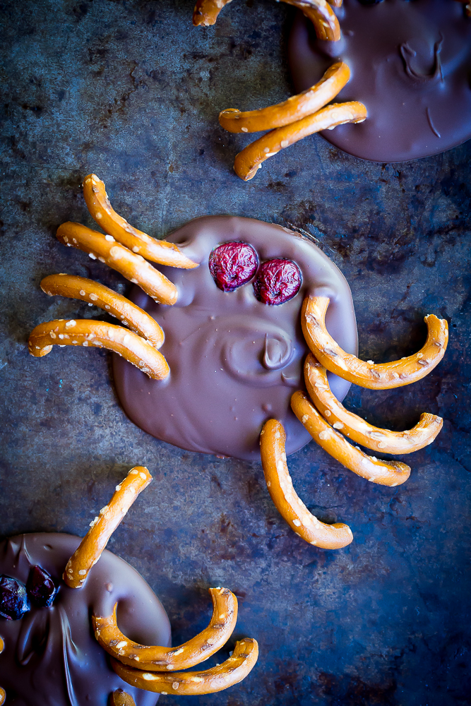 These 3 Ingredient Chocolate Bark Spiders are a fun and delicious Halloween treat! They're so easy to make and have vegan and gluten free options! Make them for your Halloween get together and everyone will love them!