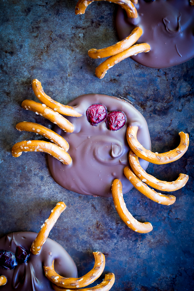 These 3 Ingredient Chocolate Bark Spiders are a fun and delicious Halloween treat! They're so easy to make and have vegan and gluten free options! Make them for your Halloween get together and everyone will love them!