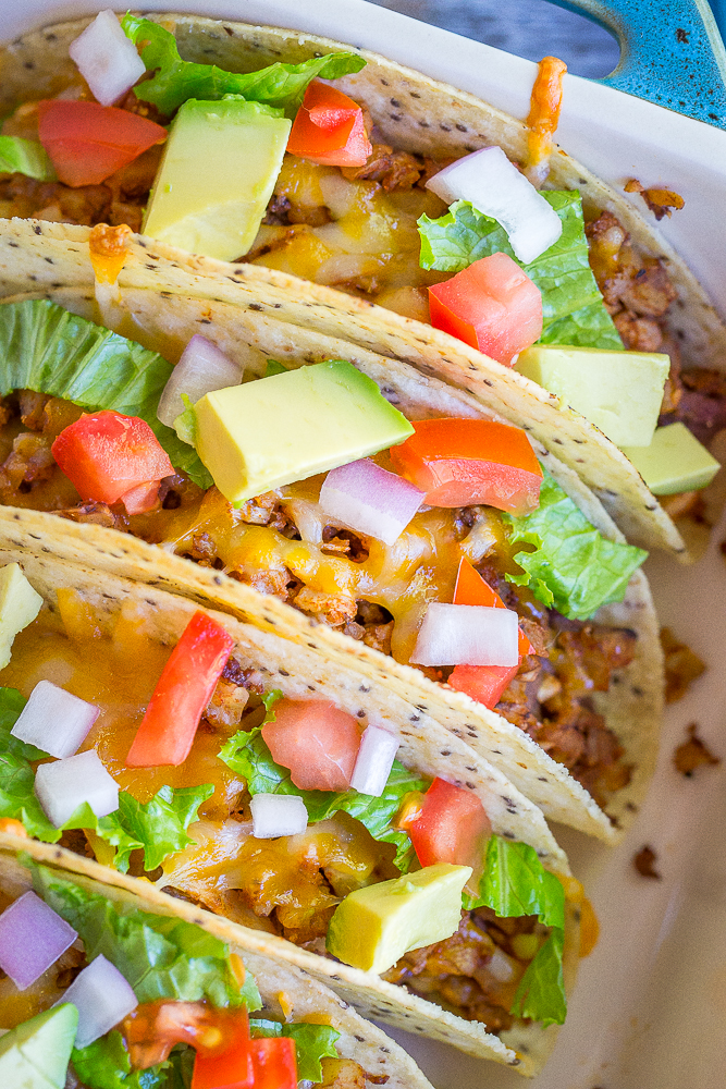 These Crispy Baked Tacos with Seasoned Cauliflower are packed with vegetables and protein making them a great healthy dinner! They're gluten free, vegetarian and quick and easy to make!