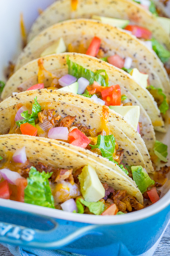 These Crispy Baked Tacos with Seasoned Cauliflower are packed with vegetables and protein making them a great healthy dinner! They're gluten free, vegetarian and quick and easy to make!