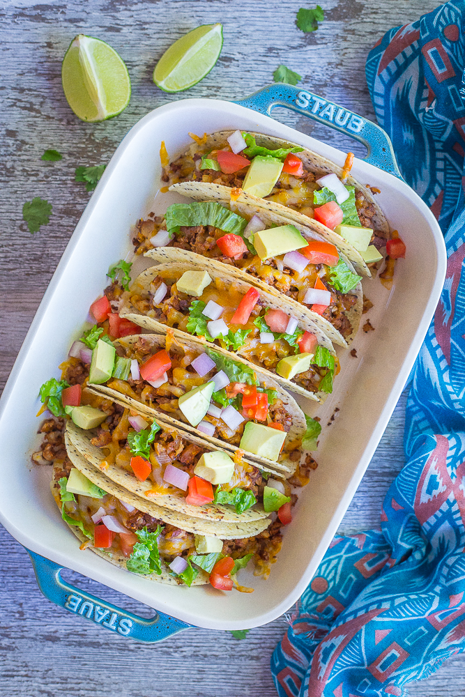 These Crispy Baked Tacos with Seasoned Cauliflower are packed with vegetables and protein making them a great healthy dinner! They're gluten free, vegetarian and quick and easy to make!
