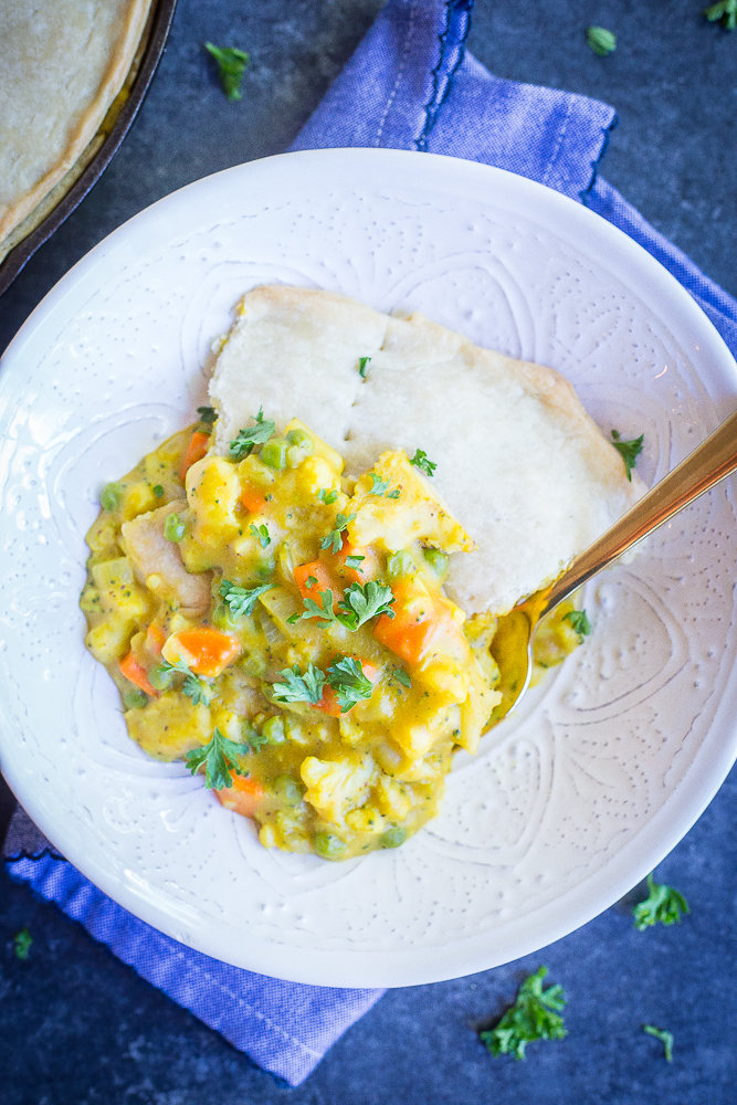 This Curried Vegetable Pot Pie is such a delicious and flavorful vegan comfort food dish! It's rich and decedent but also packed with veggies making it a healthier option! Great for dinner! #vegan #vegetarian #dinner #comfortfood #potpie