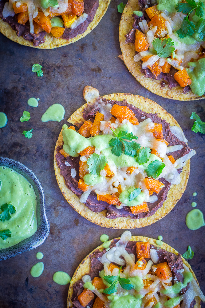 These Roasted Butternut Squash Tostadas with Avocado Lime Sauce are a really delicious easy dinner! They're healthy, vegan and gluten free! A perfect Mexican inspired fall dinner!