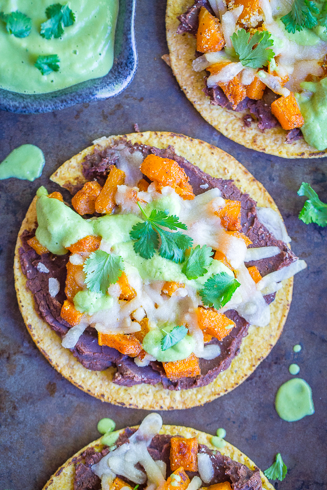 These Roasted Butternut Squash Tostadas with Avocado Lime Sauce are a really delicious easy dinner! They're healthy, vegan and gluten free! A perfect Mexican inspired fall dinner!