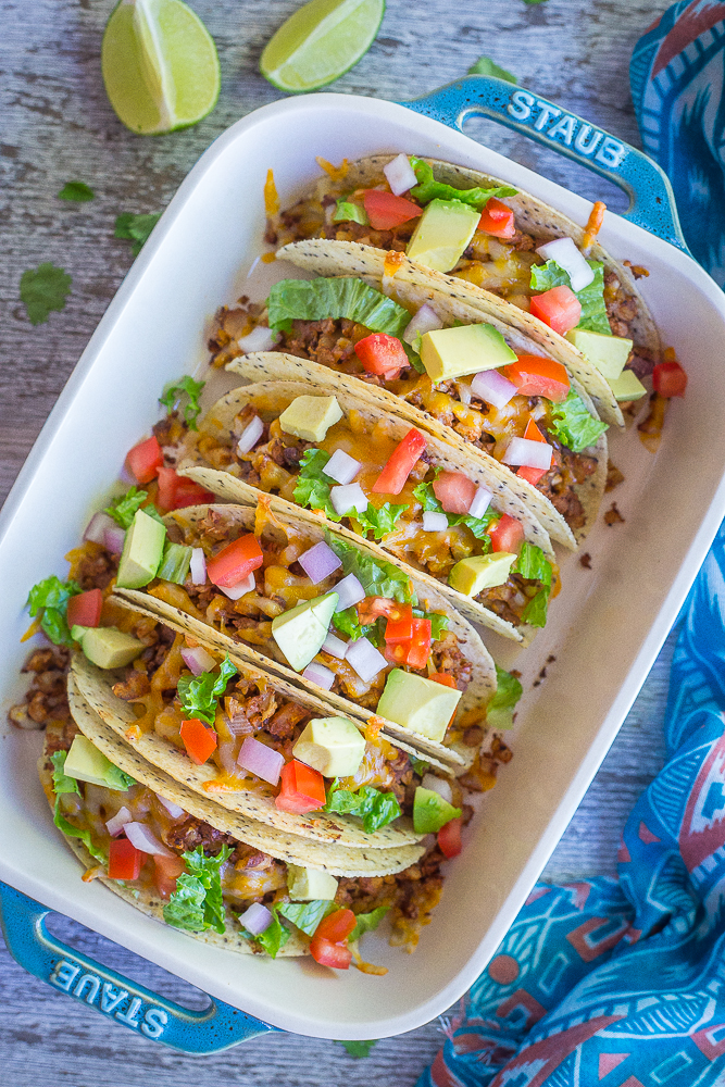 These Crispy Baked Tacos with Seasoned Cauliflower are packed with vegetables and protein making them a great healthy dinner! They're gluten free, vegetarian and quick and easy to make!