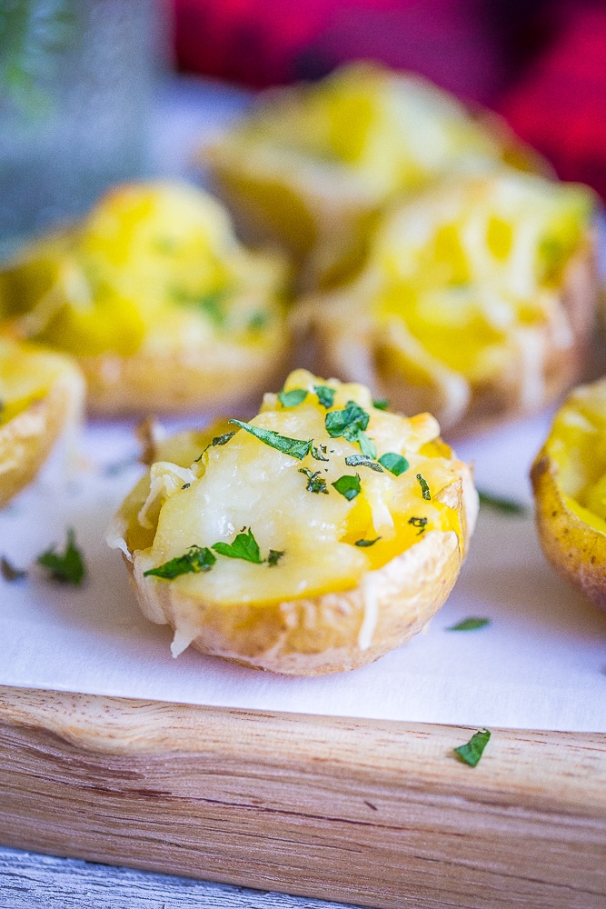 These Garlic and Herb Twice Baked Baby Potatoes are such a delicious and flavorful appetizer! They're perfect for the holidays and naturally gluten free!