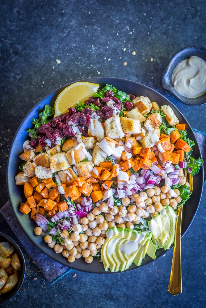 Loaded Kale Caesar salad - This healthy kale salad is loaded with tons of healthy ingredients making it so filling! It's perfect for lunch, dinner and meal prep! Naturally vegan!