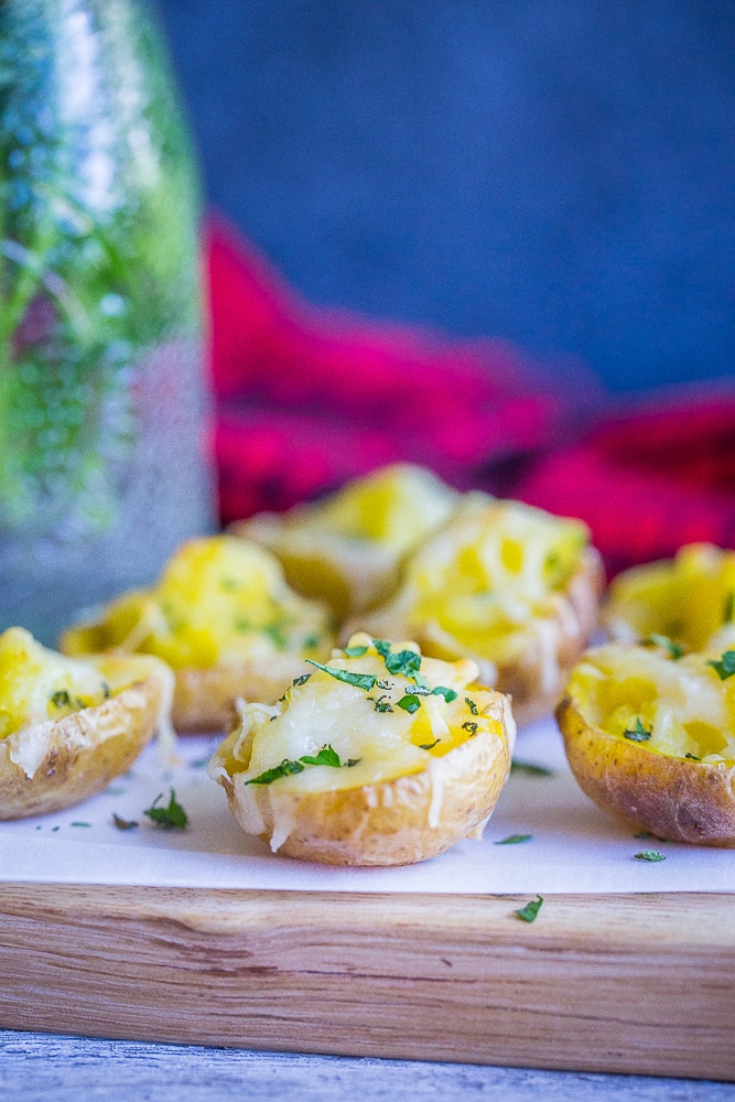 These Garlic and Herb Twice Baked Baby Potatoes are such a delicious and flavorful appetizer! They're perfect for the holidays and naturally gluten free!