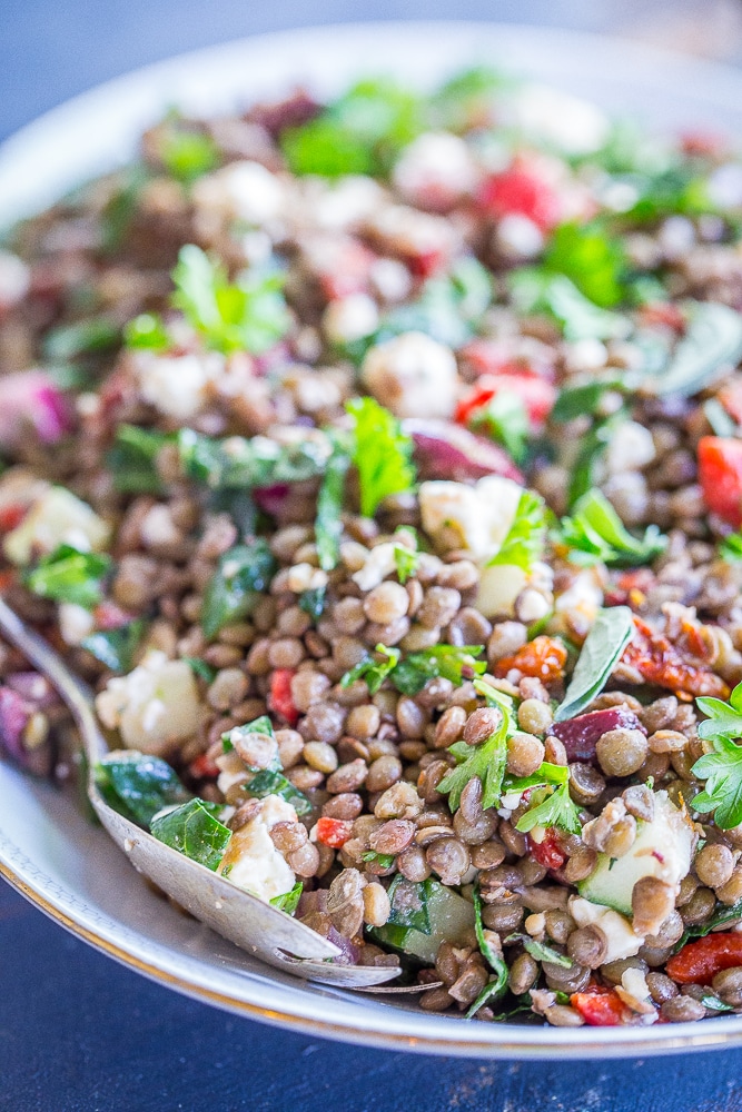 This Mediterranean Lentil Salad is a healthy and filling salad that's so easy to make! It's great for a side dish or lunch! Gluten free and vegetarian!