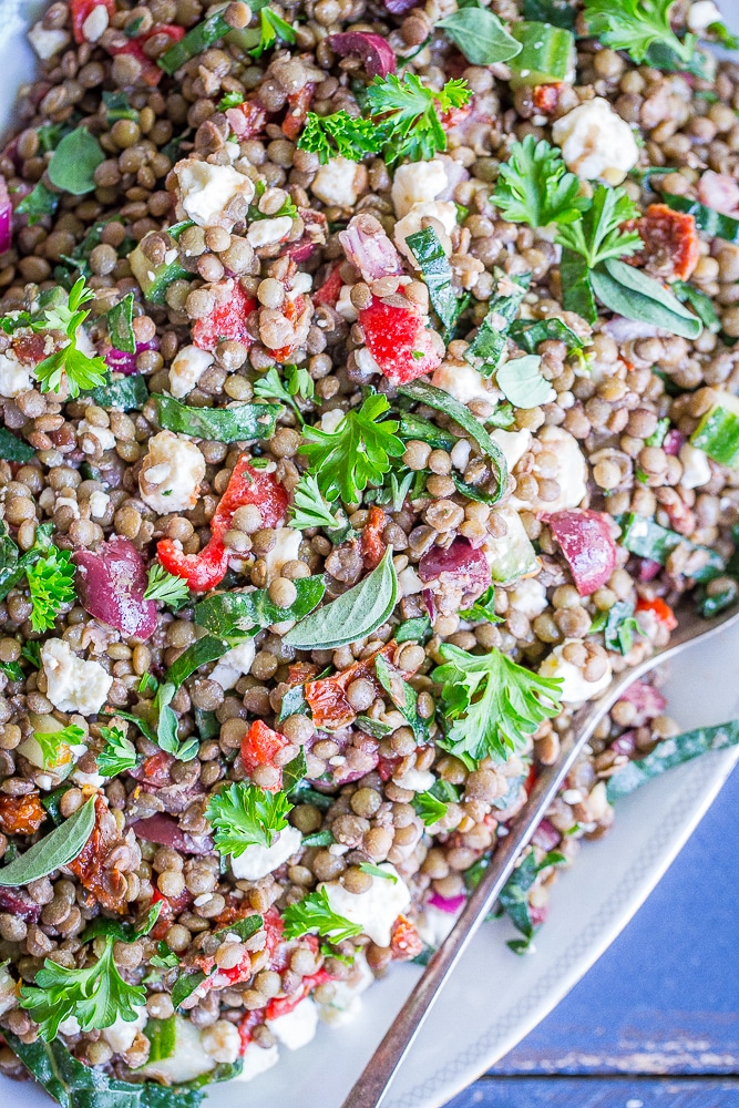 This Mediterranean Lentil Salad is a healthy and filling salad that's so easy to make! It's great for a side dish or lunch! Gluten free and vegetarian!