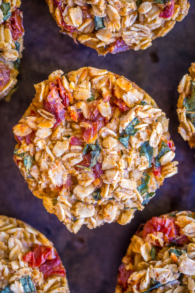 Sun-Dried Tomato and Basil - These Make Ahead Savory Baked Oatmeal Cups are perfect if you're looking for a savory vegan breakfast recipe that's easy to make and great for meal prep! There's six different flavors so you'll never get bored! They're also perfect for an afternoon snack or light lunch! Gluten free too!