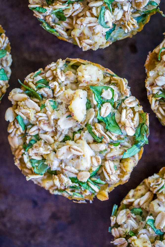 Spinach, Herb and Feta - These Make Ahead Savory Baked Oatmeal Cups are perfect if you're looking for a savory vegan breakfast recipe that's easy to make and great for meal prep! There's six different flavors so you'll never get bored! They're also perfect for an afternoon snack or light lunch! Gluten free too!
